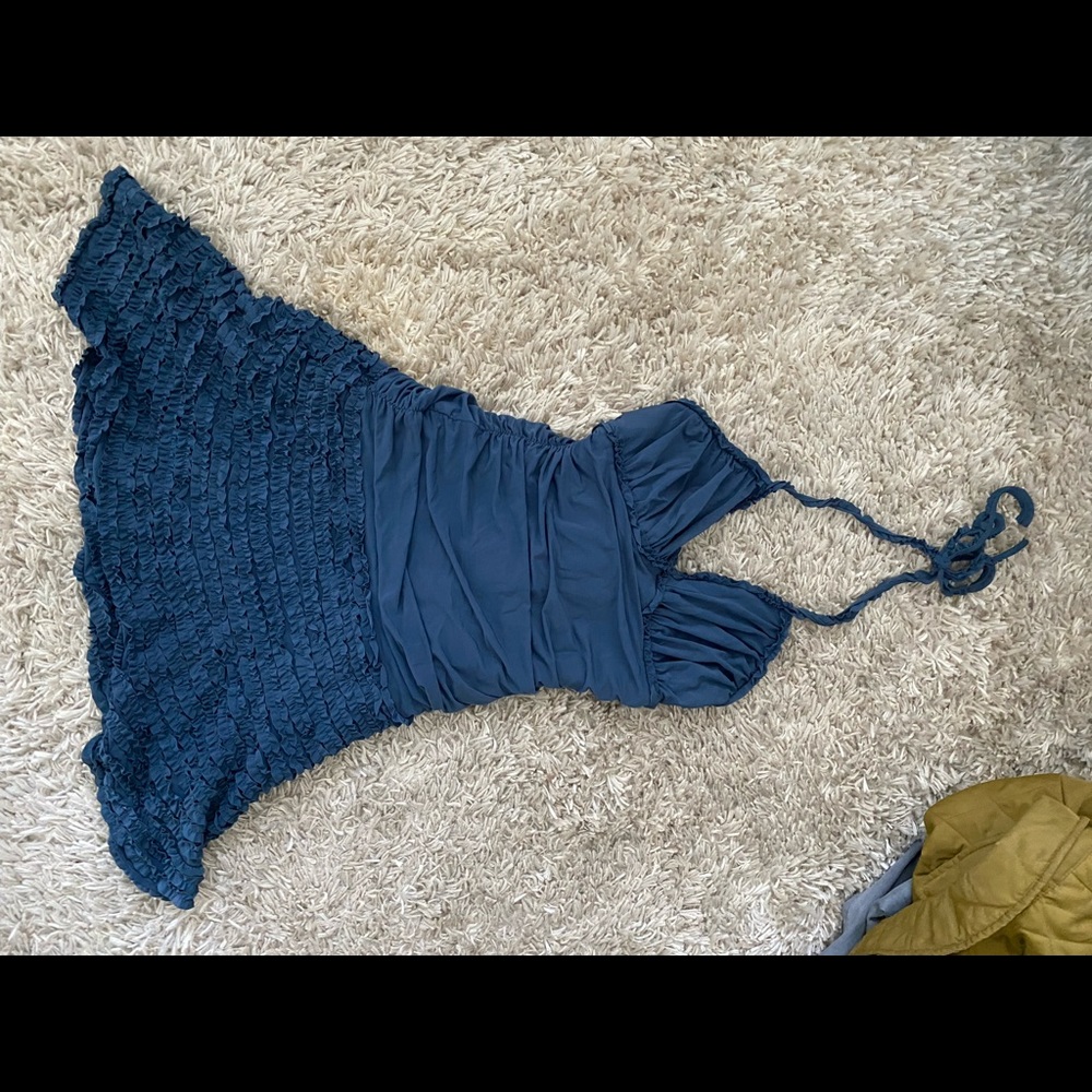 BCBG cocktail dress in rich dark blue. Cute frill detailing on edges and skirt.